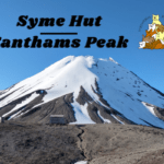 Syme Hut at the Fanthams Peak with Mt Taranaki backdrop